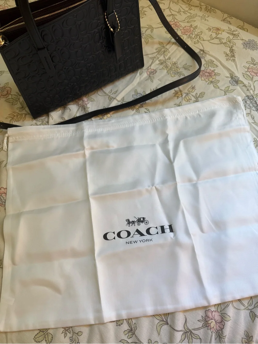 Coach Charlie Carryall 28 in Signature Embossed Leather